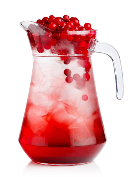 Full jug of fresh cranberries nonalcoholic cocktail with berries isolated - Foto, immagini
