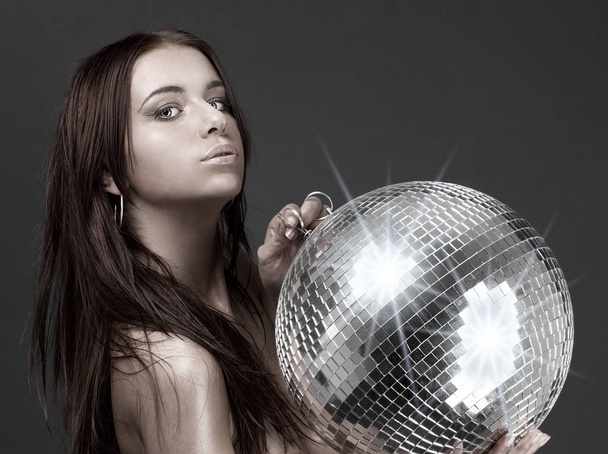 picture of beautiful naked woman with disco ball - 写真・画像