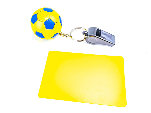 Soccer ball and referee whistle with cards on a white background. - Photo, Image