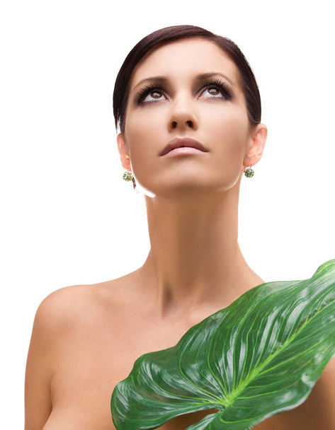 picture of woman with green leaf over white - Foto, Imagem