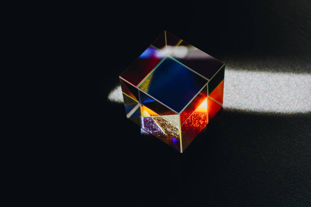 Colorful bright glass prism cube  Refracting light in vivid rain - Фото, зображення