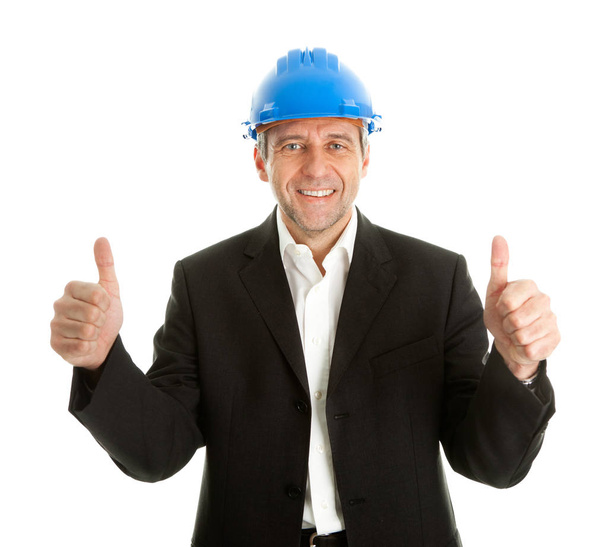 Portrait of successfull architect wearing blue hard hat. Isolated on white - Foto, afbeelding
