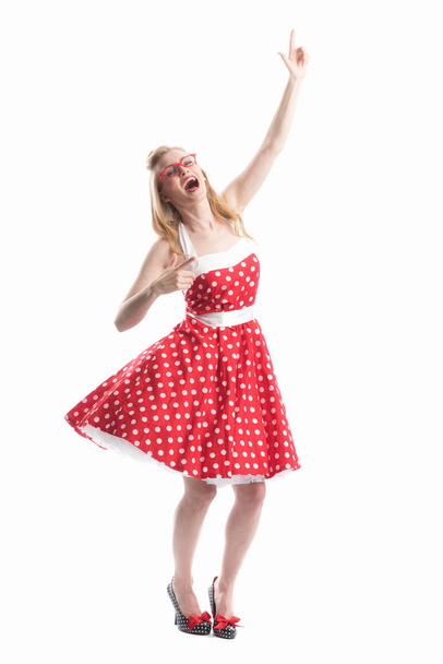 a woman in summer dress is happy and rejoices - Foto, afbeelding