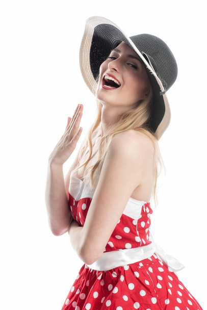 flirting an elegant woman in summer dress and hat - Foto, Imagen