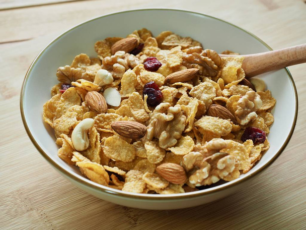 Spoon with cereal and nut mix - Photo, Image