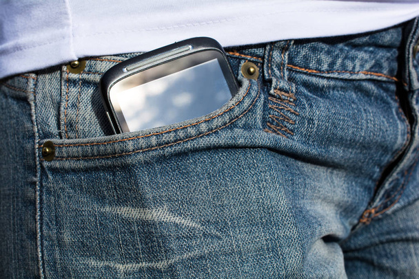 Woman With Smartphone In Her Pants Pocket - Φωτογραφία, εικόνα
