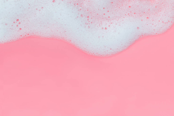 Pink foam bubbles on pink background - 写真・画像