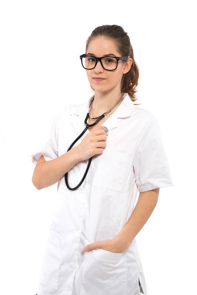 woman in white coat and stethoscope with - Valokuva, kuva