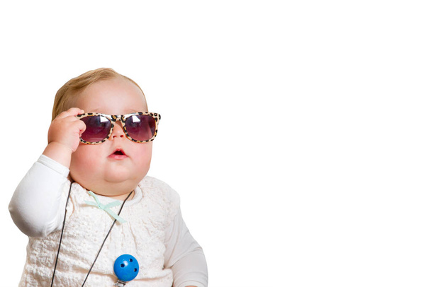 baby with sunglasses,released on a white background - Foto, afbeelding