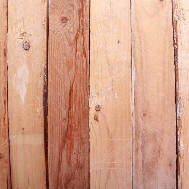 Rustic bare wooden plank background texture with parallel boards showing wood grain, knots and glue in a square full frame panel - Foto, immagini