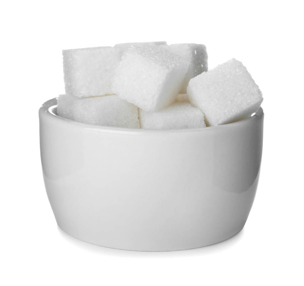 Refined sugar cubes in bowl isolated on white - 写真・画像