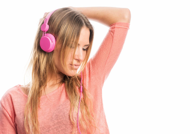 sensual woman face with headphone listening music - Foto, imagen