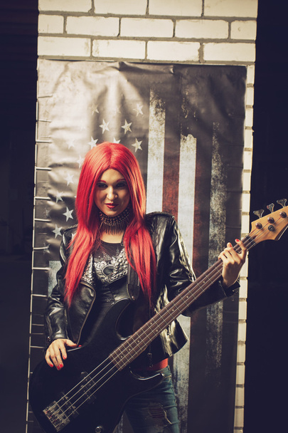 Rocker with bass guitar - Zdjęcie, obraz