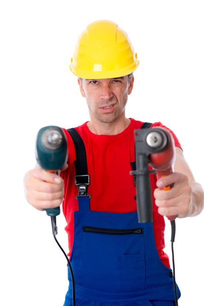 wild man with helmet and two drilling machine - Photo, image