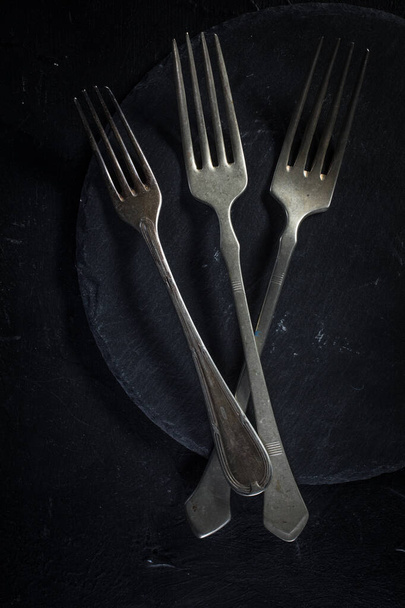 A few old silver forks. - Foto, Imagen