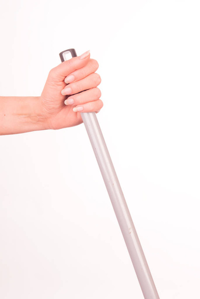 hand holding a brush on white background - Foto, afbeelding