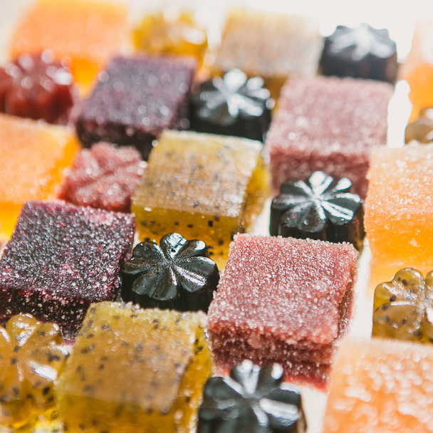 Many different fruit paste candies. Whole background. Selective focus. warm colors - Foto, imagen