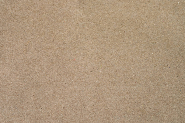 茶色の紙、クラフト抽象的な背景。レトロで古いアンティークのヴィンテージ紙のアートパターンのテクスチャの背景。テキストのための無料のスペースコピーとパターンの詳細板紙テクスチャ. - 写真・画像