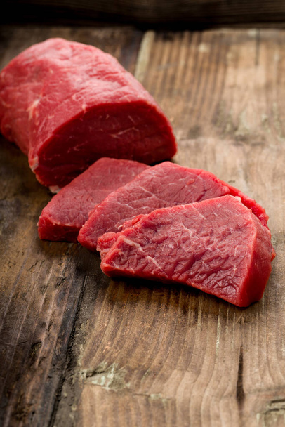 fresh sirloin steak sliced \u200b\u200bon a background - Foto, Bild