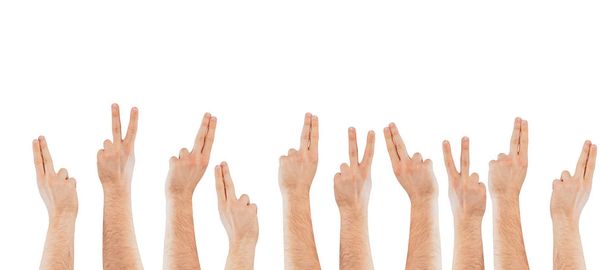 Los dedos levantados sobre un fondo claro. El concepto de aplicación, la voluntad de hacer preguntas. Levanta las manos.
. - Foto, Imagen