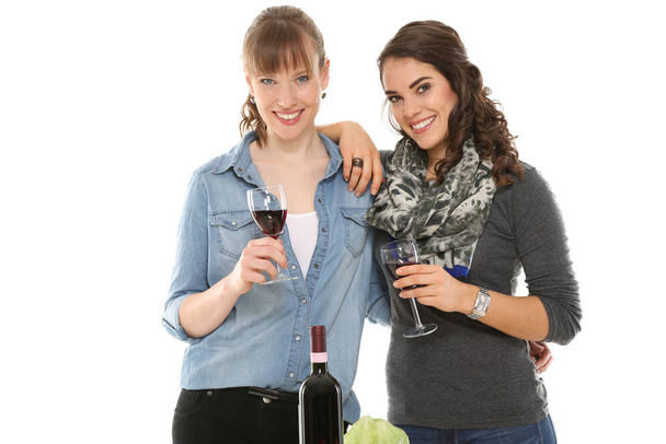 girlfriends drinking a glass of wine together - Foto, Imagem