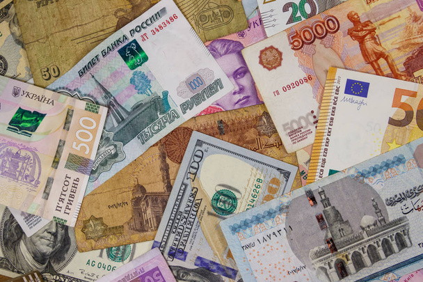 ユーロの多通貨背景私たちのドル、ロシアのルーブル、エジプトのポンドとウクライナのリビア - 写真・画像