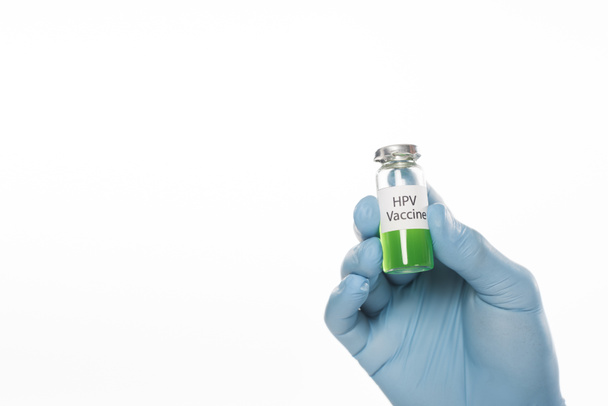 Cropped view of doctor in latex glove holding jar with hpv vaccine isolated on white - 写真・画像