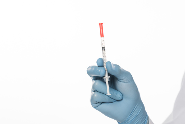Cropped view of doctor in latex glove holding syringe isolated on white - Photo, Image