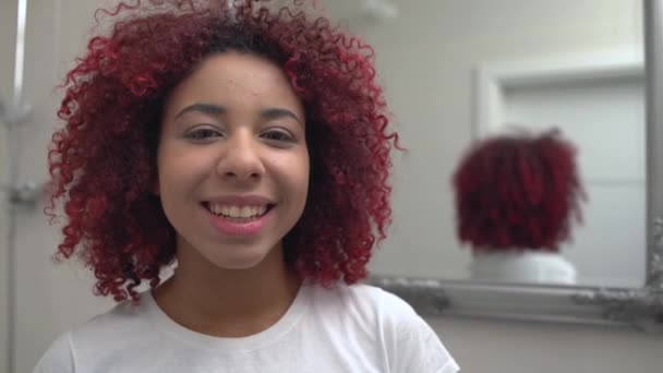 Cheerful young woman smiling at camera, teenage skin care, cosmetology, wellness - Filmagem, Vídeo