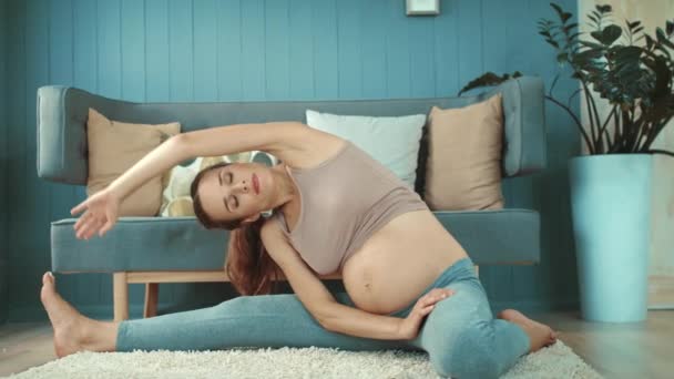 Closeup expectant mother making prenatal yoga at home in slow motion. - Felvétel, videó