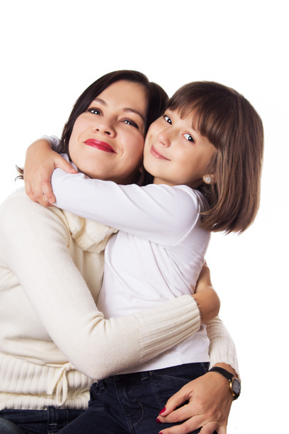 Happy mother and daughter hugging - Photo, image
