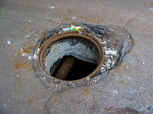 Open sewer manhole on the road - Photo, Image