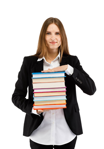 Woman in suit posing with books on white copy space background - Zdjęcie, obraz