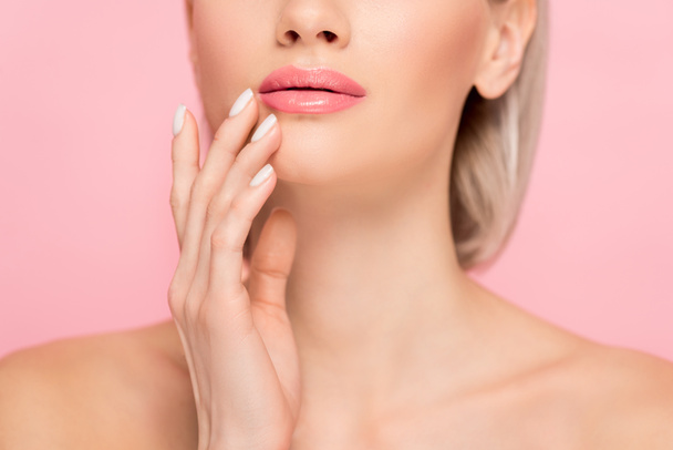 cropped view of tender girl with perfect skin, isolated on pink - Foto, afbeelding