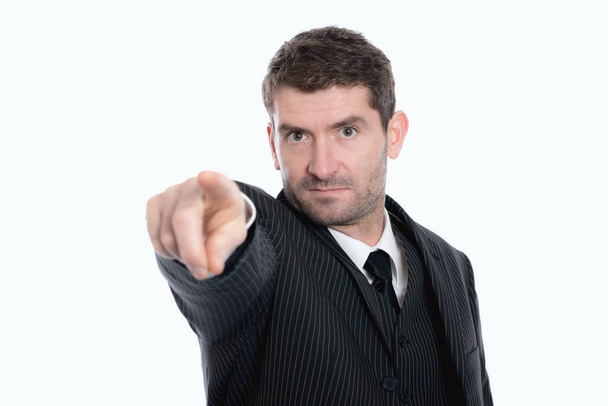 businessman in suit is pointing in to the camera - Photo, image