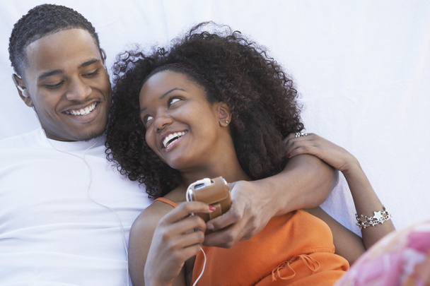 Couple Listening to MP3 Player - Photo, image