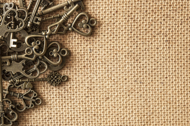 many different retro, vintage keys lie  - Фото, зображення