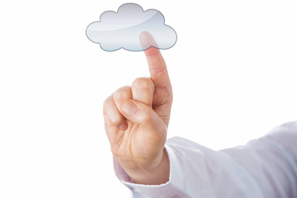 Close up of a male index finger touching an empty cloud computing icon from behind. The transparent cloud symbol does offer space for graphic overlay or copy text. Cutout isolated on white background. - Photo, Image