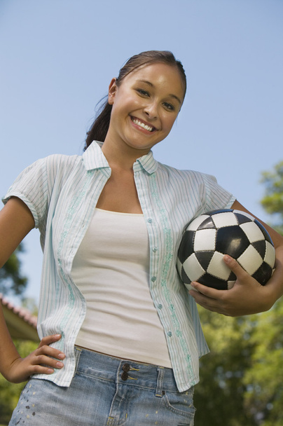Woman Holding Soccer Ball. - 写真・画像