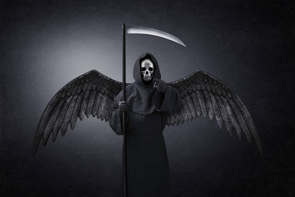 Angel of death pointing at you in the dark - Фото, изображение