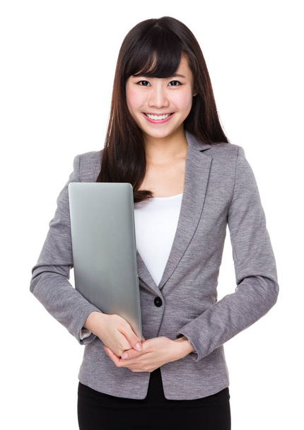 Asian businesswoman hold with laptop - Fotó, kép