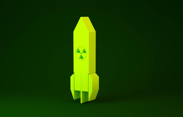 Gelbe Atomrakete auf grünem Hintergrund. Rakete fliegt herunter. Minimalismus-Konzept. 3D Illustration 3D Renderer - Foto, Bild