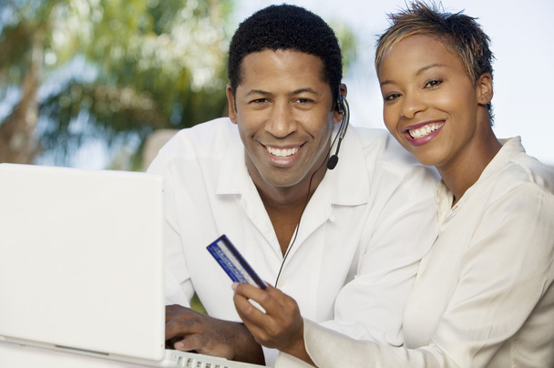 Couple making online purchase - Photo, image