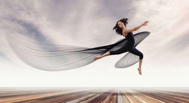 Gymnast girl in jump Mixed media - Valokuva, kuva