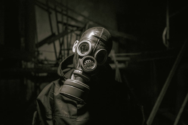 A soldier in a gas mask. Stalker. Corona virus. Ebola. - 写真・画像