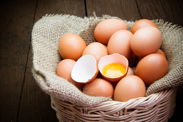 broken chicken eggs and egg yolk - Foto, immagini