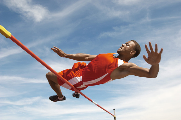 Male high jumper - Foto, afbeelding
