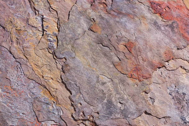 rough surface of a colored stone slab - Φωτογραφία, εικόνα