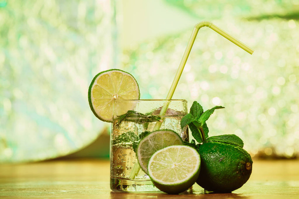 Mojito cocktail with fresh lime on wood  table - 写真・画像