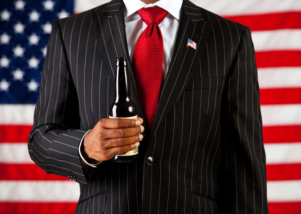 Politician: Holding a Beer Bottle - Fotoğraf, Görsel
